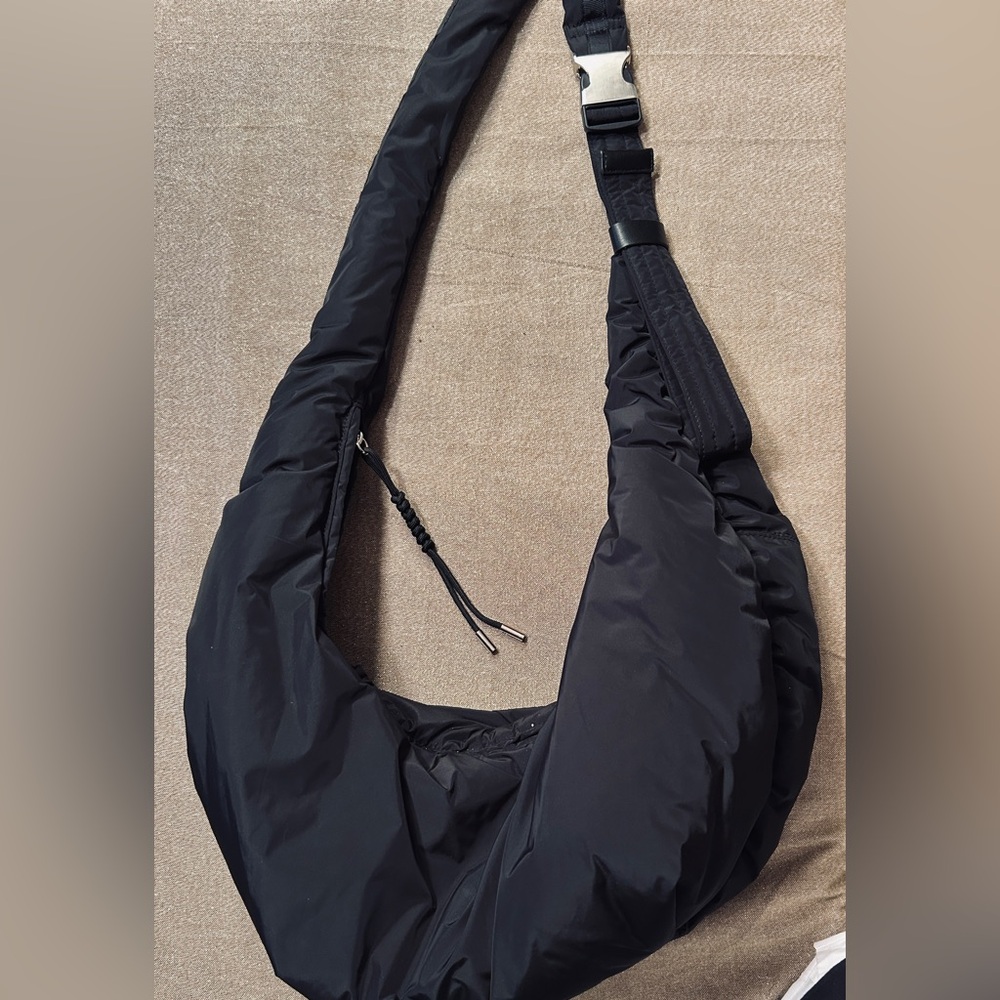 Dolce Vita oversized Black Nylon Messenger Bag. Top zipper with adjustable strap